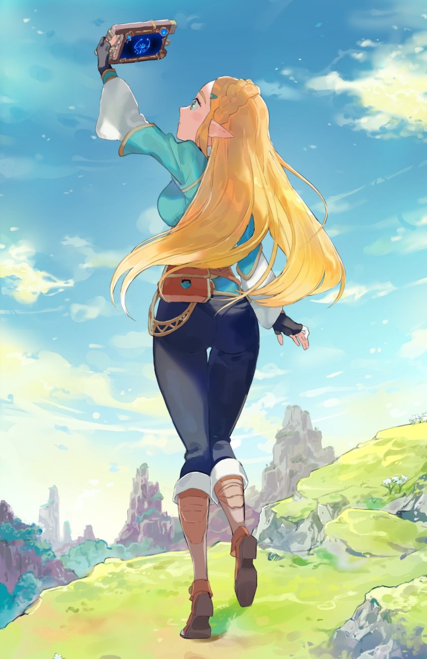 1girl, aisutabetao, arm_up, ass, bag, black_gloves, blonde_hair, blue_pants, blue_shirt, blue_sky, boots, braid, breasts, brown_bag, brown_boots, cloud, crown_braid, day, fingerless_gloves, floating_hair, from_behind, full_body, gloves, green_eyes, hair_ornament, hairclip, highres, holding, large_breasts, long_hair, looking_away, mountain, nintendo, outdoors, pants, pointy_ears, princess_zelda, satchel, sheikah_slate, shirt, sky, solo, the_legend_of_zelda, the_legend_of_zelda:_breath_of_the_wild