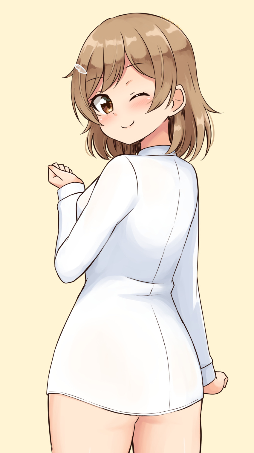 1girl, absurdres, blush, bob_cut, brown_eyes, brown_hair, clenched_hand, closed_mouth, commentary, cowboy_shot, from_behind, hair_ornament, hairclip, highres, long_sleeves, looking_at_viewer, looking_back, naked_shirt, no_pants, one_eye_closed, original, shiraha_maru, shirone_(shiraha_maru), shirt, short_hair, simple_background, smile, solo, standing, white_shirt, yellow_background