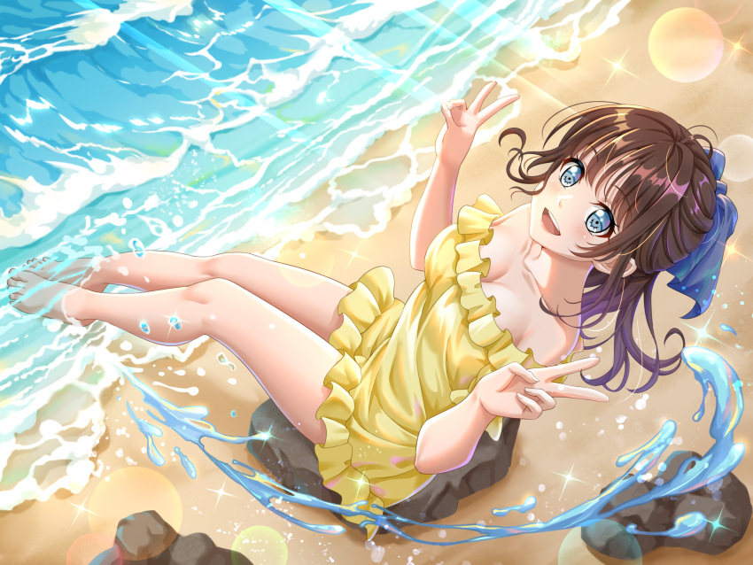1girl, absurdres, animification, bare_shoulders, barefoot, beach, blue_eyes, blurry, breasts, cleavage, double_v, dress, frilled_dress, frills, highres, izone, lens_flare, medium_breasts, open_mouth, real_life, rock, sitting, smile, solo, sparkle, strapless, strapless_dress, v, water, yabuki_nako, yellow_dress, yohane_yoshiko