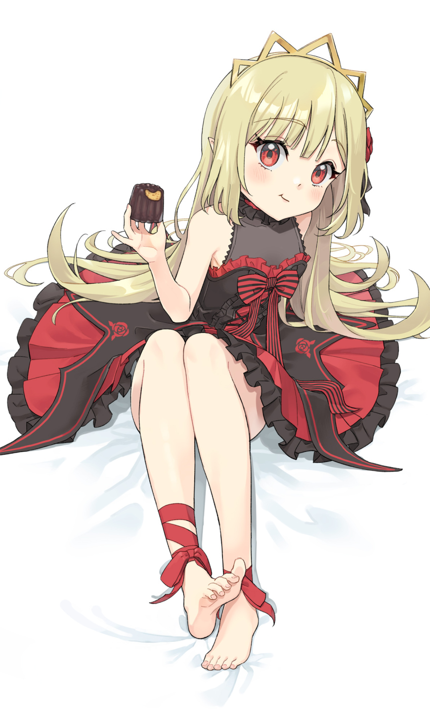 1girl, :t, ankle_ribbon, bare_shoulders, barefoot, bed_sheet, black_dress, blonde_hair, blush, bow, bowtie, breasts, closed_mouth, commentary_request, dress, eating, ecute, feet, flower, food, food_bite, food_request, frills, full_body, hair_flower, hair_ornament, highres, holding, holding_food, jashin-chan_dropkick, leg_ribbon, lolita_fashion, long_hair, looking_at_viewer, oitsuki_(getsumen_diver), partial_commentary, red_dress, red_eyes, red_ribbon, ribbon, rose, simple_background, sitting, small_breasts, smile, soles, solo, striped_bow, striped_bowtie, striped_clothes, tiara, toenails, toes, two-tone_dress, very_long_hair, white_background