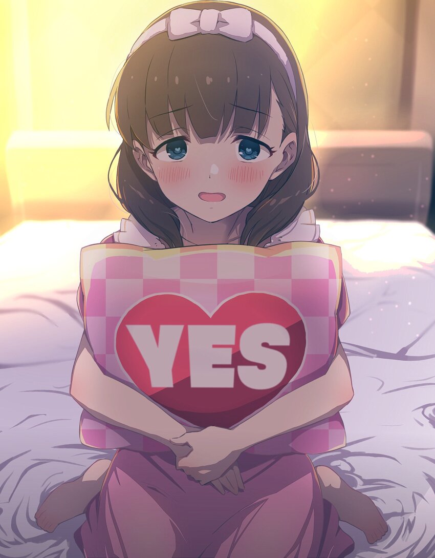 1girl, barefoot, bed_sheet, blush, bow_hairband, brown_hair, dress, hairband, heart, heart-shaped_pupils, highres, idolmaster, idolmaster_cinderella_girls, indoors, looking_at_viewer, nanananananasea, hugging_object, on_bed, own_hands_together, pillow, pillow_hug, pink_dress, sakuma_mayu, sitting, solo, symbol-shaped_pupils, wariza, yes, yes-no_pillow
