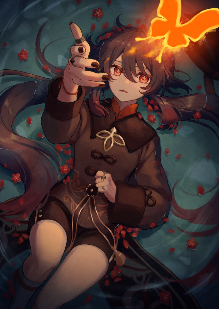 1girl, 39_iduki, black_nails, black_shorts, brown_hair, bug, butterfly, flower, flower-shaped_pupils, genshin_impact, gradient_hair, hair_between_eyes, highres, hu_tao_(genshin_impact), insect, jewelry, long_hair, long_sleeves, looking_at_viewer, lying, multicolored_hair, multiple_rings, nail_polish, on_back, parted_lips, petals, red_eyes, red_flower, red_hair, ring, short_shorts, shorts, sidelocks, socks, solo, symbol-shaped_pupils, twintails, very_long_hair, water, white_socks