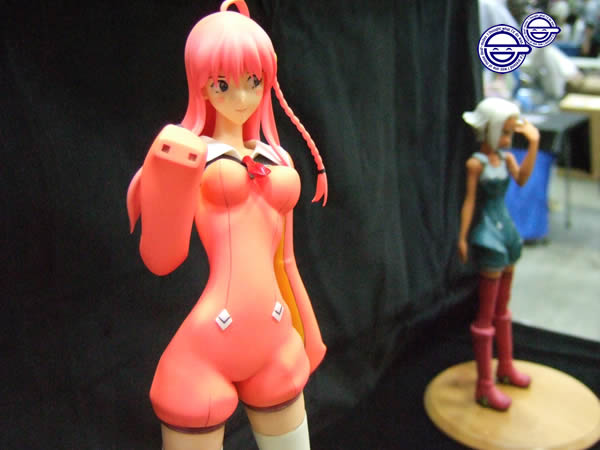 00s, 2girls, ahoge, akibablog, bare_shoulders, blue_bodysuit, blurry, blush_stickers