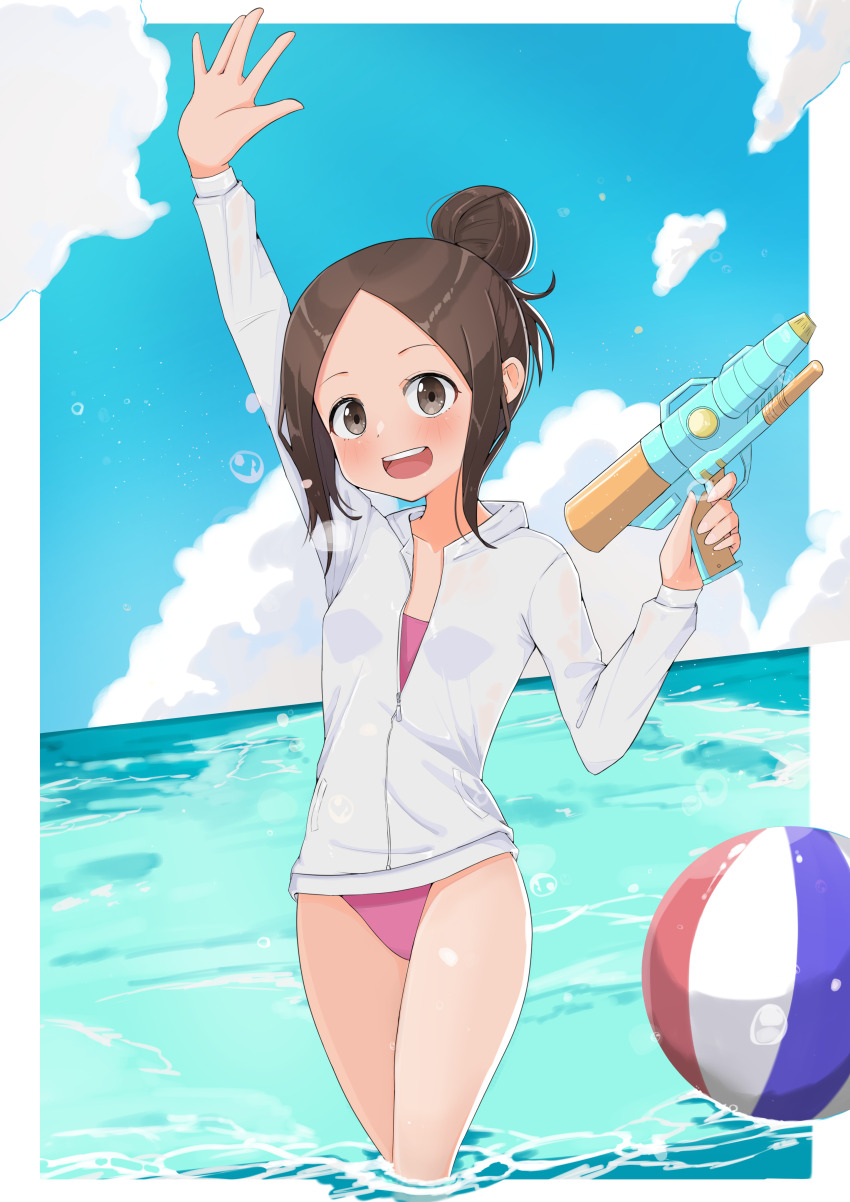1girl, :d, absurdres, alternate_hairstyle, arm_up, ball, beachball, blush, brown_hair, day, hair_bun, highres, holding, holding_water_gun, karakai_jouzu_no_takagi-san, long_sleeves, one-piece_swimsuit, oo_s, open_mouth, outdoors, parted_bangs, pink_one-piece_swimsuit, shirt, smile, swimsuit, takagi-san, wading, water, water_gun, white_shirt