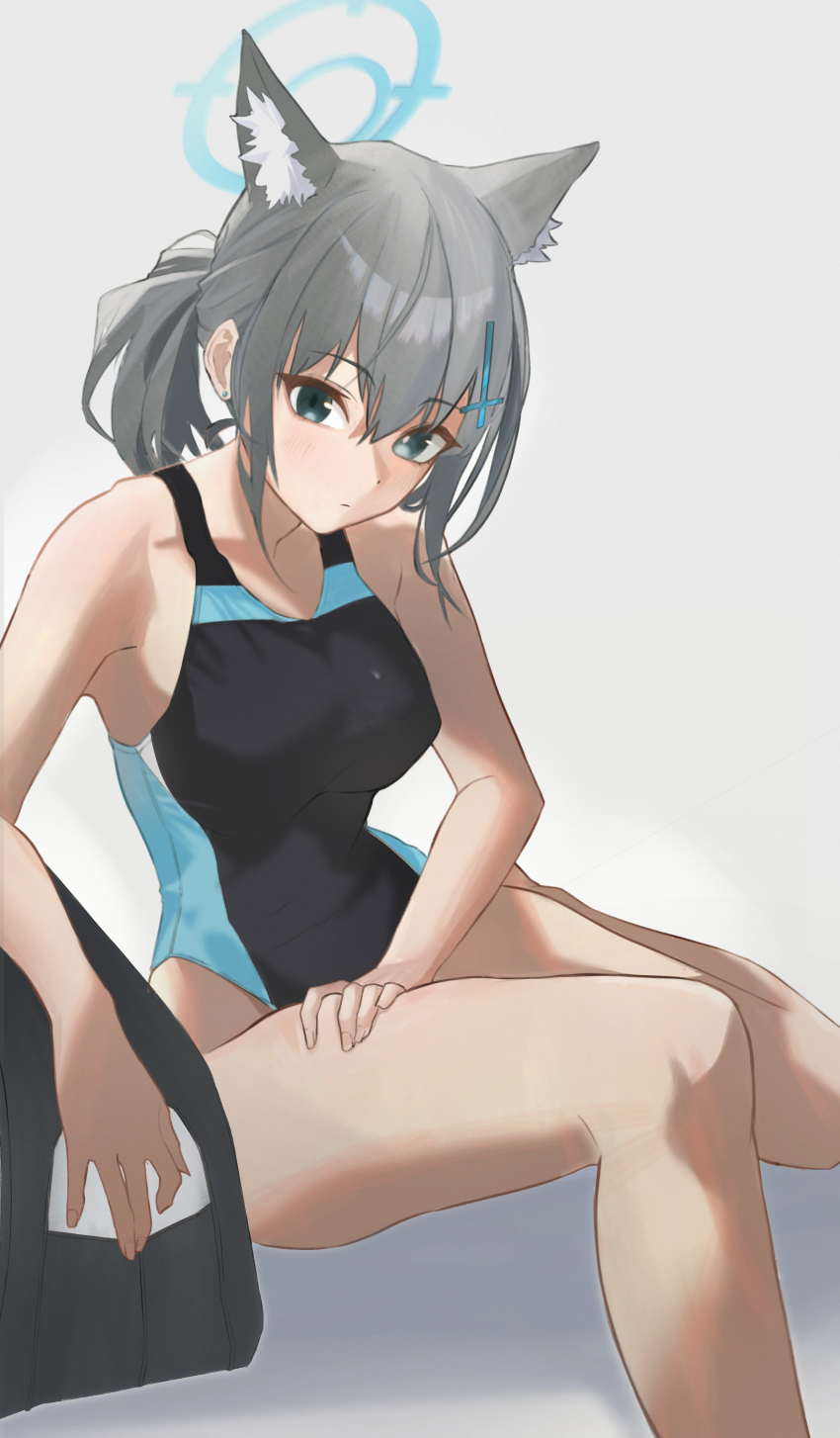 1girl, absurdres, aiueottoman, animal_ear_fluff, animal_ears, bag, black_one-piece_swimsuit, blue_archive, blue_eyes, breasts, competition_swimsuit, covered_navel, cross_hair_ornament, extra_ears, grey_hair, hair_ornament, halo, highres, looking_at_viewer, low_ponytail, medium_breasts, medium_hair, mismatched_pupils, multicolored_swimsuit, official_alternate_costume, one-piece_swimsuit, ponytail, shiroko_(blue_archive), shiroko_(swimsuit)_(blue_archive), sitting, solo, swimsuit, wolf_ears