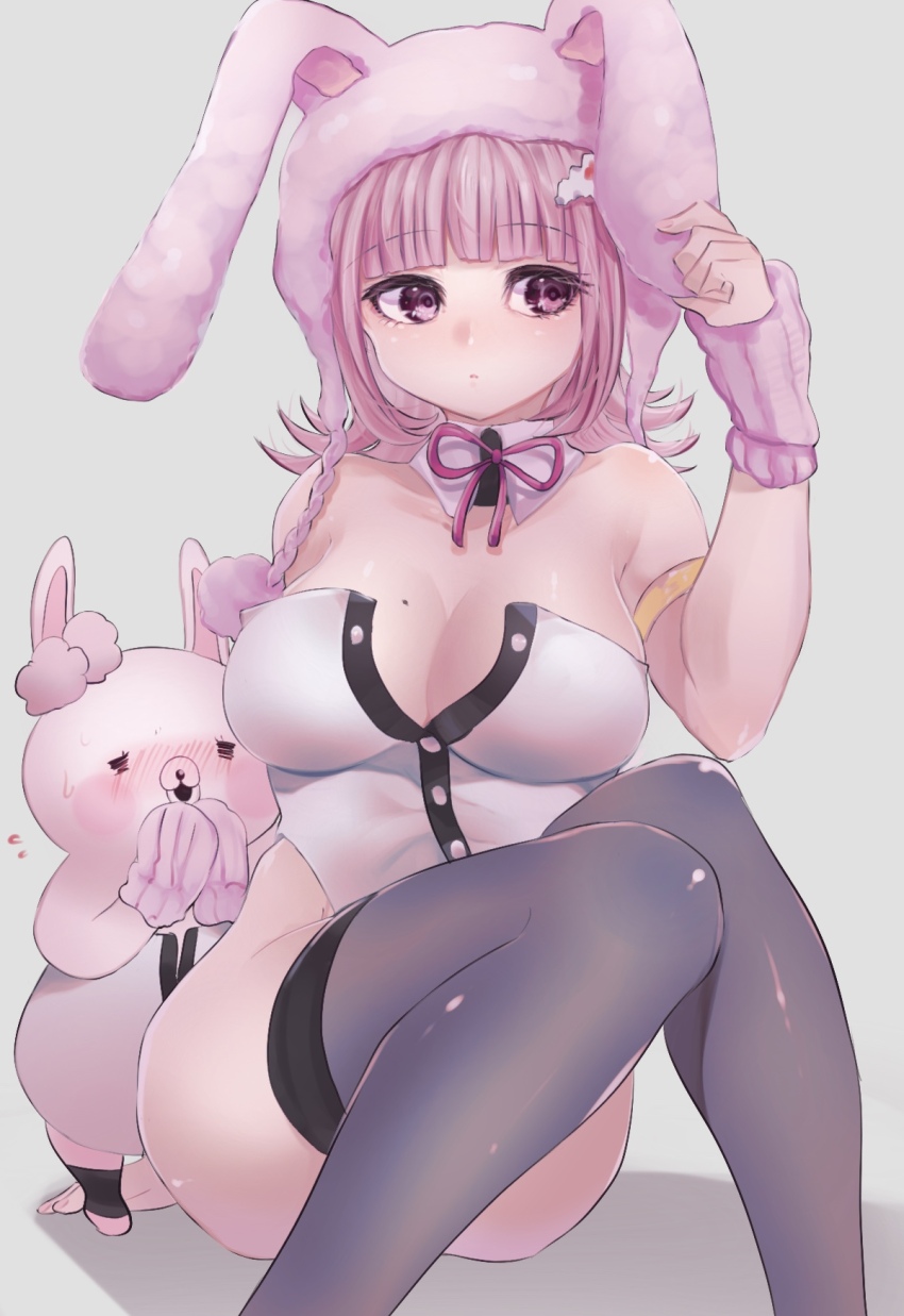 1girl, armlet, ass, blue-bell, bow, breasts, cleavage, danganronpa_(series), danganronpa_2:_goodbye_despair, detached_collar, female_focus, highres, jewelry, large_breasts, leotard, matching_hair/eyes, mole, mole_on_breast, multicolored_leotard, nanami_chiaki, pink_bow, pink_eyes, pink_hair, pink_ribbon, playboy_bunny, rabbit, rabbit_ears, ribbon, sitting, tagme, two-tone_leotard, usami_(danganronpa)