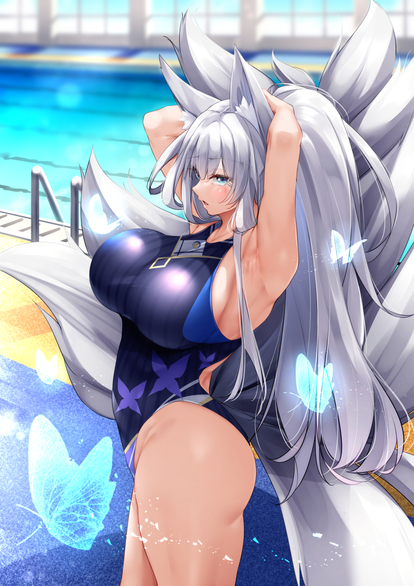1girl, absurdres, alternate_costume, animal_ears, animal_print, armpits, arms_behind_head, ass, azur_lane, blue_butterfly, blue_eyes, blue_one-piece_swimsuit, blurry, blurry_background, breasts, bug, butterfly, butterfly_print, competition_swimsuit, cowboy_shot, fox_ears, fox_tail, from_side, glowing_butterfly, grey_hair, highres, huge_breasts, indoors, insect, kitsune, kyuubi, large_tail, long_hair, looking_at_viewer, multiple_tails, one-piece_swimsuit, oriue_wato, pool, pool_ladder, shinano_(azur_lane), solo, standing, swimsuit, tail, transparent_butterfly, very_long_hair, white_tail