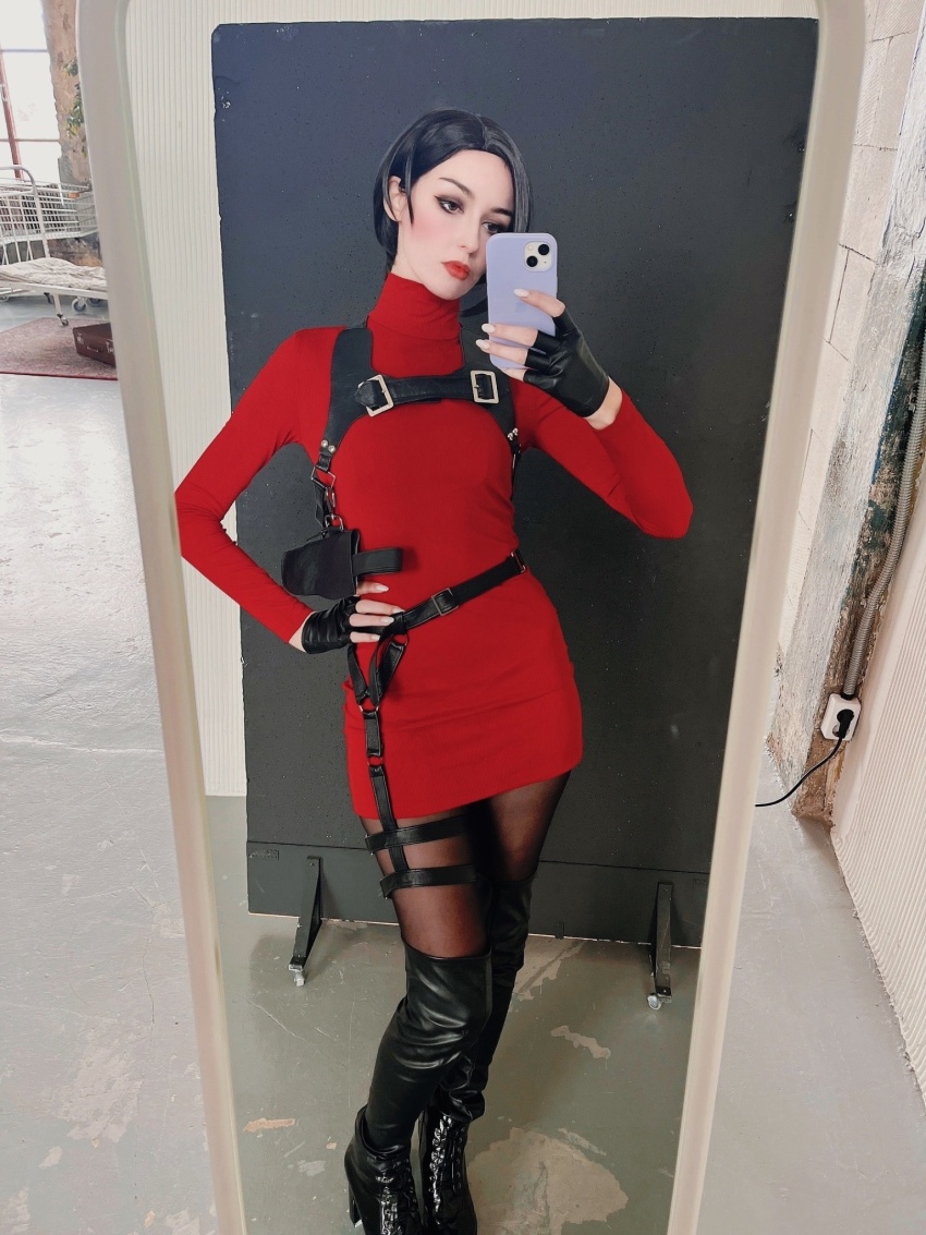 1girl, ada_wong, ada_wong_(cosplay), black_eyes, black_hair, cosplay, facing_viewer, hand_on_own_hip