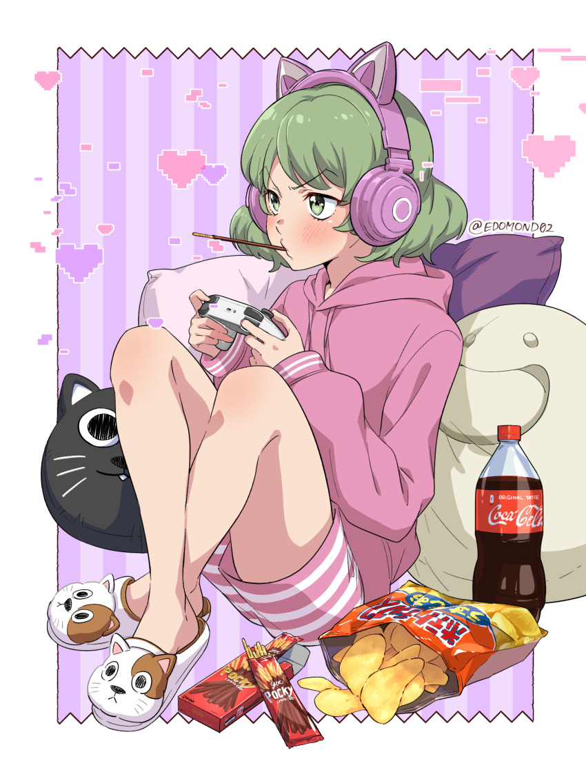 1girl, animal_ear_headphones, animal_ears, artist_name, blush, bottle, cat_ear_headphones, cat_ears, chips_(food), coca-cola, commentary_request, controller, edomon-do, fake_animal_ears, food, food_in_mouth, full_body, game_controller, green_eyes, green_hair, headphones, heart, highres, holding, holding_controller, holding_game_controller, hood, hoodie, knees_up, long_sleeves, mochi_(mona_lisa_no_zaregoto), mona_lisa_no_zaregoto, mouth_hold, pillow, pink_hoodie, pink_shorts, pocky, pocky_in_mouth, potato_chips, short_hair, shorts, sitting, solo, striped_clothes, striped_shorts, twitter_username, wasabi_(mona_lisa_no_zaregoto), watermark, white_footwear