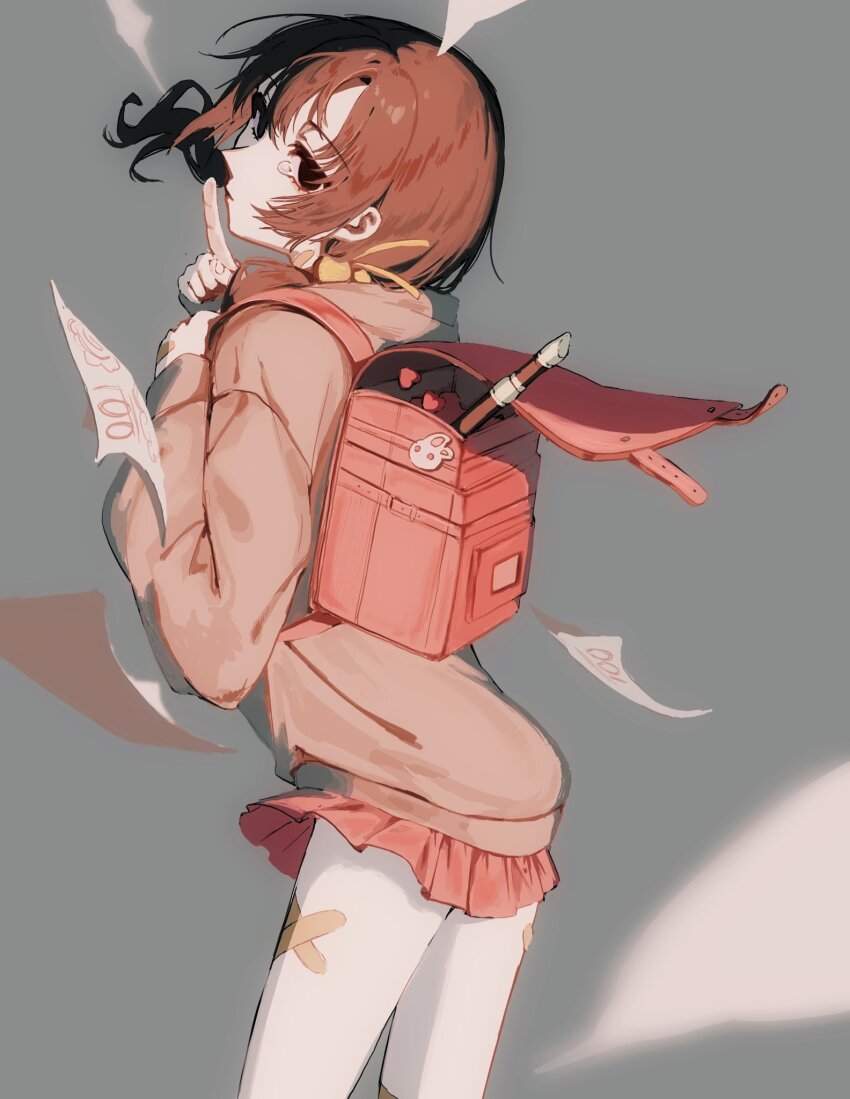 1girl, alternate_costume, backpack, bag, bag_charm, bandaid, bandaid_on_leg, black_eyes, blurry, blurry_foreground, charm_(object), commentary_request, crossed_bandaids, empty_eyes, expressionless, finger_to_mouth, floating_hair, flute, from_behind, grey_background, hair_bobbles, hair_ornament, half-closed_eyes, hands_up, highres, himitsu_no_shougakusei_(vocaloid), holding_strap, hood, hood_down, hoodie, index_finger_raised, instrument, kaai_yuki, long_sleeves, looking_at_viewer, looking_back, low_twintails, miniskirt, nuwaa_(nuwaaa_4690_), pink_hoodie, pleated_skirt, randoseru, recorder, red_hair, red_skirt, shushing, simple_background, skirt, solo, standing, tearing_up, test_score, twintails, vocaloid