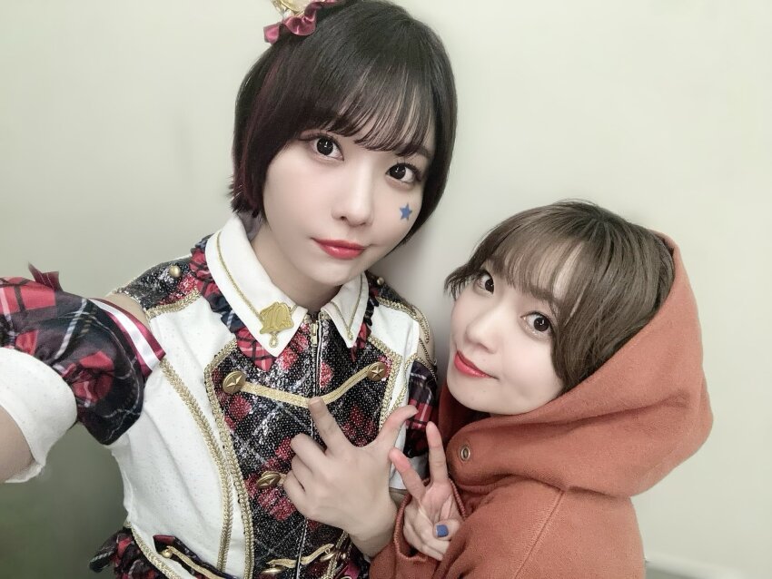 2girls, highres, multiple_girls, photo_(medium), saito_shuka, selfie, simple_background, smile