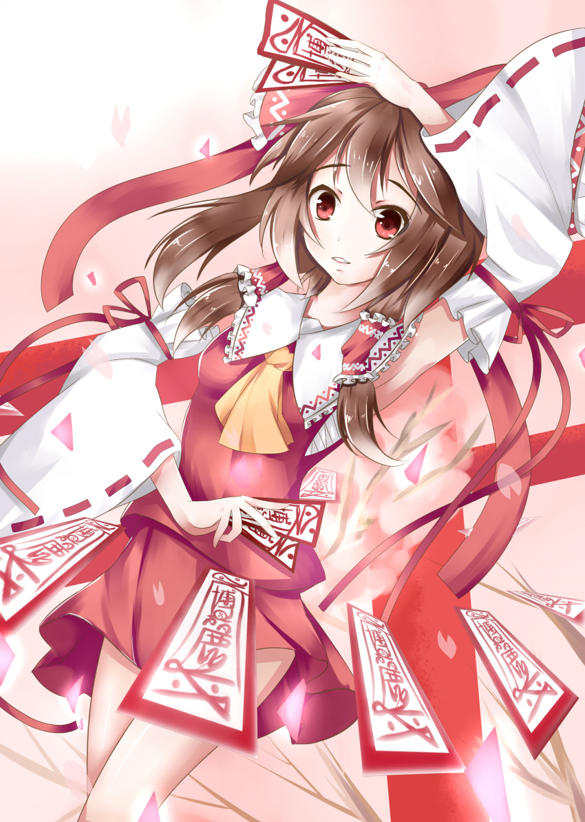 1girl, absurdres, arm_above_head, armpits, ascot, bow, brown_hair, detached_sleeves, dutch_angle, hair_bow, hair_tubes, hakurei_reimu, highres, looking_at_viewer, mero_(3445036), ofuda, parted_lips, payot, petals, pink_background, ponytail, red_eyes, sarashi, short_hair, simple_background, skirt, skirt_set, solo, torii, touhou