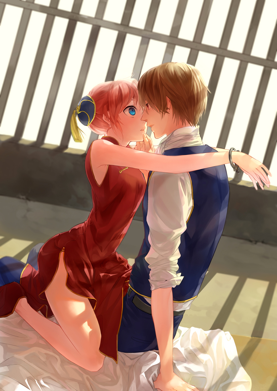 1boy, 1girl, blue_eyes, brown_hair, bun_cover, chin_grab, chinese_clothes, cuffs