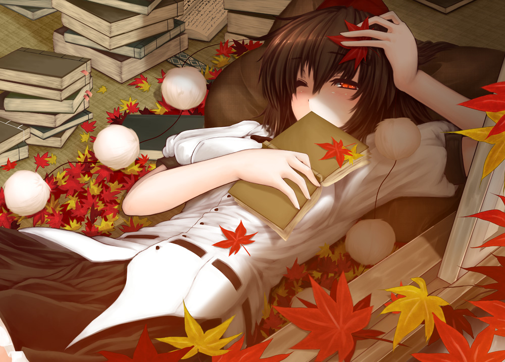 1girl, book, brown_hair, gizensha, hat, leaf, lying, on_back