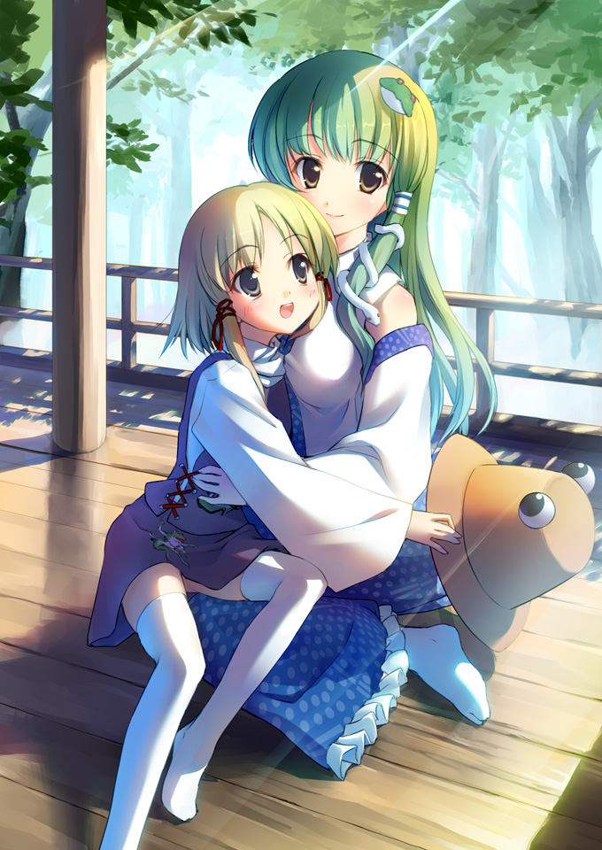 2girls, blonde_hair, detached_sleeves, eyes, frog, green_hair, hair_ornament, hat, hat_removed, headwear_removed, holding, holding_hat, hug, kochiya_sanae, long_hair, moriya_suwako, multiple_girls, short_hair, sitting, snake, sunbeam, sunlight, tako_(roast), takoyaki_(roast), thighhighs, touhou, tree, wooden_floor, yellow_eyes