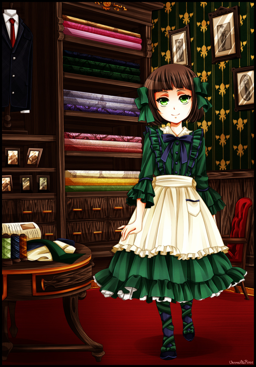 1girl, artist_name, bangs, black_border, book, border, bow, brown_hair, derivative_work, drawer, dress, formal, green_dress, green_eyes, hair_ribbon, highres, indoors, kuroshitsuji, looking_at_viewer, necktie, photo_(object), ribbon, shelf, short_hair, sieglinde_sullivan, signature, smile, solo, string, suit, table, vermeillerose, wallpaper_(object)