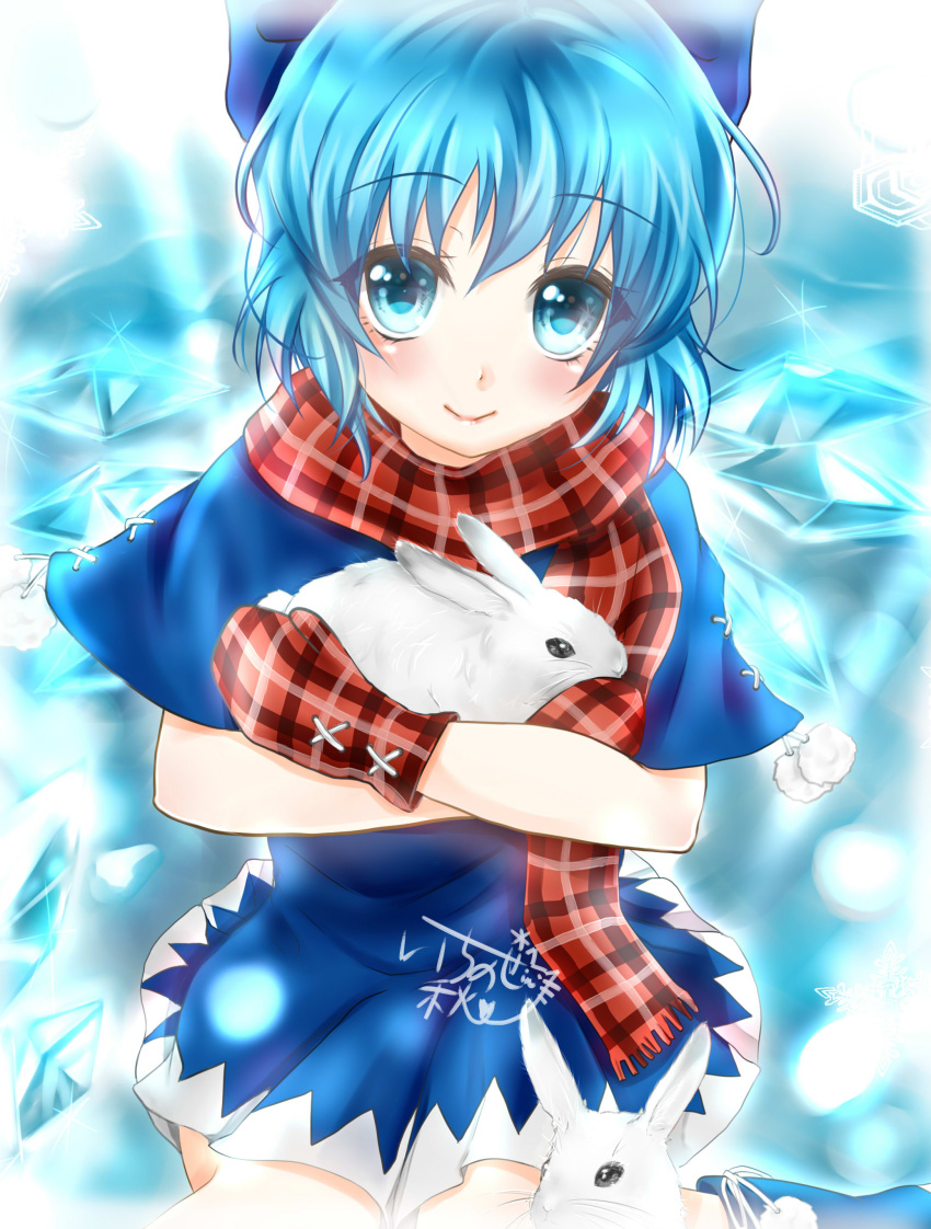 1girl, absurdres, animal, artist_name, blue_eyes, blue_hair, bow, capelet, cirno, dress, hair_bow, highres, holding_animal, ice, ice_wings, ichinose_aki, looking_at_viewer, mittens, pom_pom_(clothes), rabbit, scarf, short_hair, signature, smile, touhou, wings