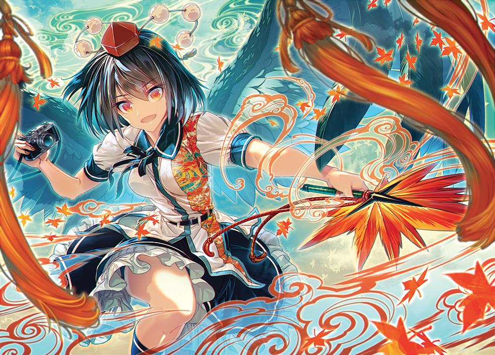 1girl, :d, belt, bird_wings, black_hair, black_ribbon, black_skirt, black_wings, camera, commentary_request, cover, cowboy_shot, digital_camera, feathered_wings, frilled_skirt, frills, hat, hauchiwa, holding, holding_camera, holding_fan, leaf-pattern_stripe, looking_at_viewer, neck_ribbon, open_mouth, orange_eyes, pom_pom_(clothes), puffy_short_sleeves, puffy_sleeves, ribbon, shameimaru_aya, shirt, short_hair, short_sleeves, skirt, smile, solo, tokin_hat, touhou, white_shirt, wings, zounose