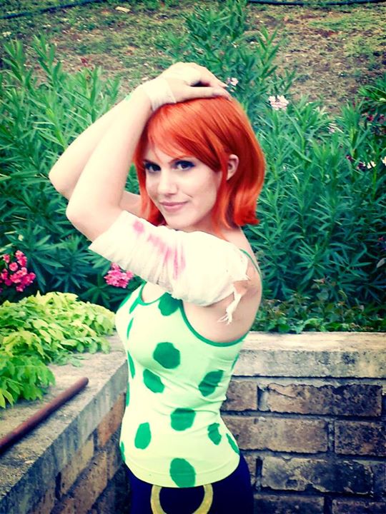 1girl, bandage, camisole, cosplay, nami_(one_piece), nami_(one_piece)_(cosplay), one_piece, orange_hair