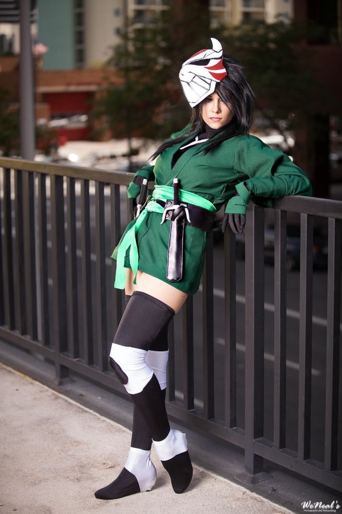 1girl, asymmetrical_clothes, black_hair, black_legwear, cat_mask, cheshire, cosplay, dc_comics