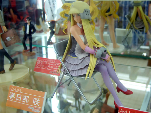blonde_hair, cosplay, figure, genshiken, helmet, kasukabe_saki, kujibiki_unbalance, long_hair