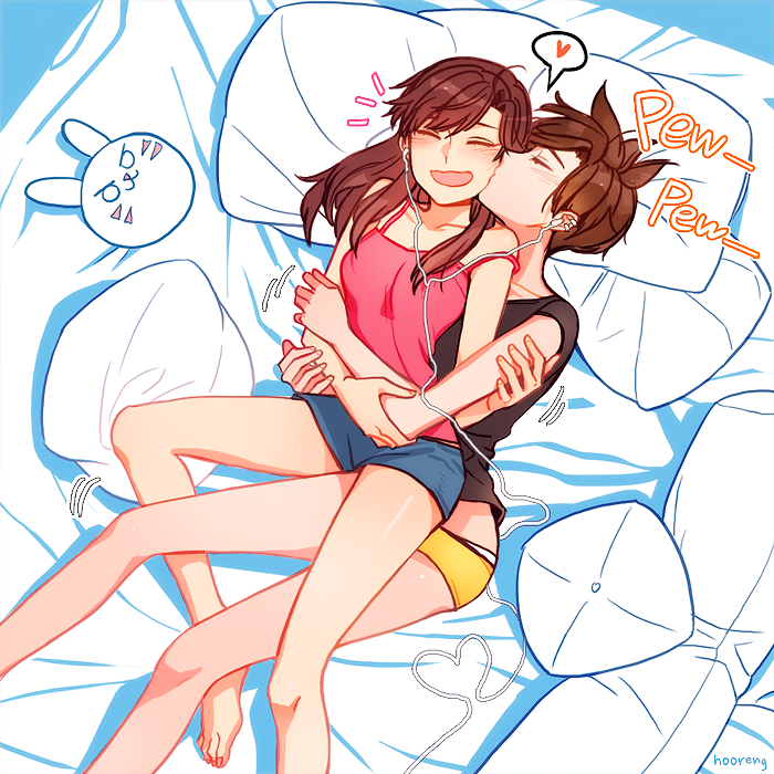 >:3, /\/\/\, 2girls, :3, bare_shoulders, barefoot, bed, bed_sheet, blue_shorts, blush, breasts, brown_shirt, bunny_pillow, cable, camisole, cheek_kiss, closed_mouth, collarbone, d.va_(overwatch), earphones, facepaint, facial_mark, heart, hooreng, hug, hug_from_behind, kiss, lying, multiple_girls, on_back, on_bed, open_mouth, overwatch, pillow, shared_earphones, shirt, short_shorts, short_sleeves, shorts, sleeveless, smile, spoken_heart, toenails, tracer_(overwatch), whisker_markings, yuri