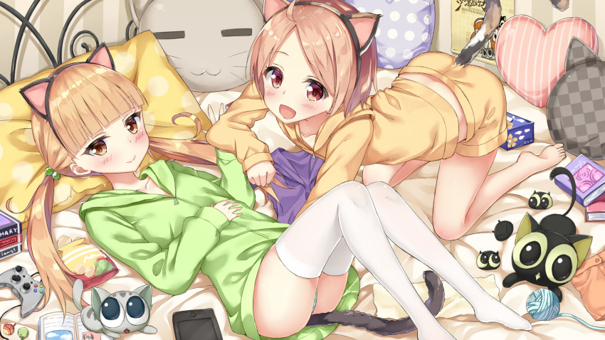 2girls, animal_ears, bed, black_cat, book, cat, cat_ears, cat_pillow