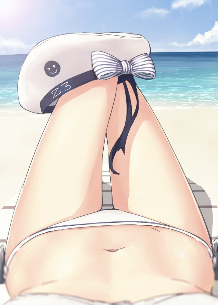 1girl, beach, bikini, blue_sky, blurry, bow, clothes_writing, clouds