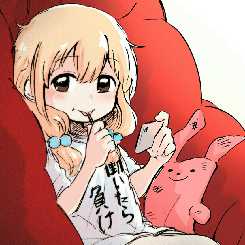 1girl, bean_bag_chair, blonde_hair, brown_eyes, candy, cellphone, food, futaba_anzu