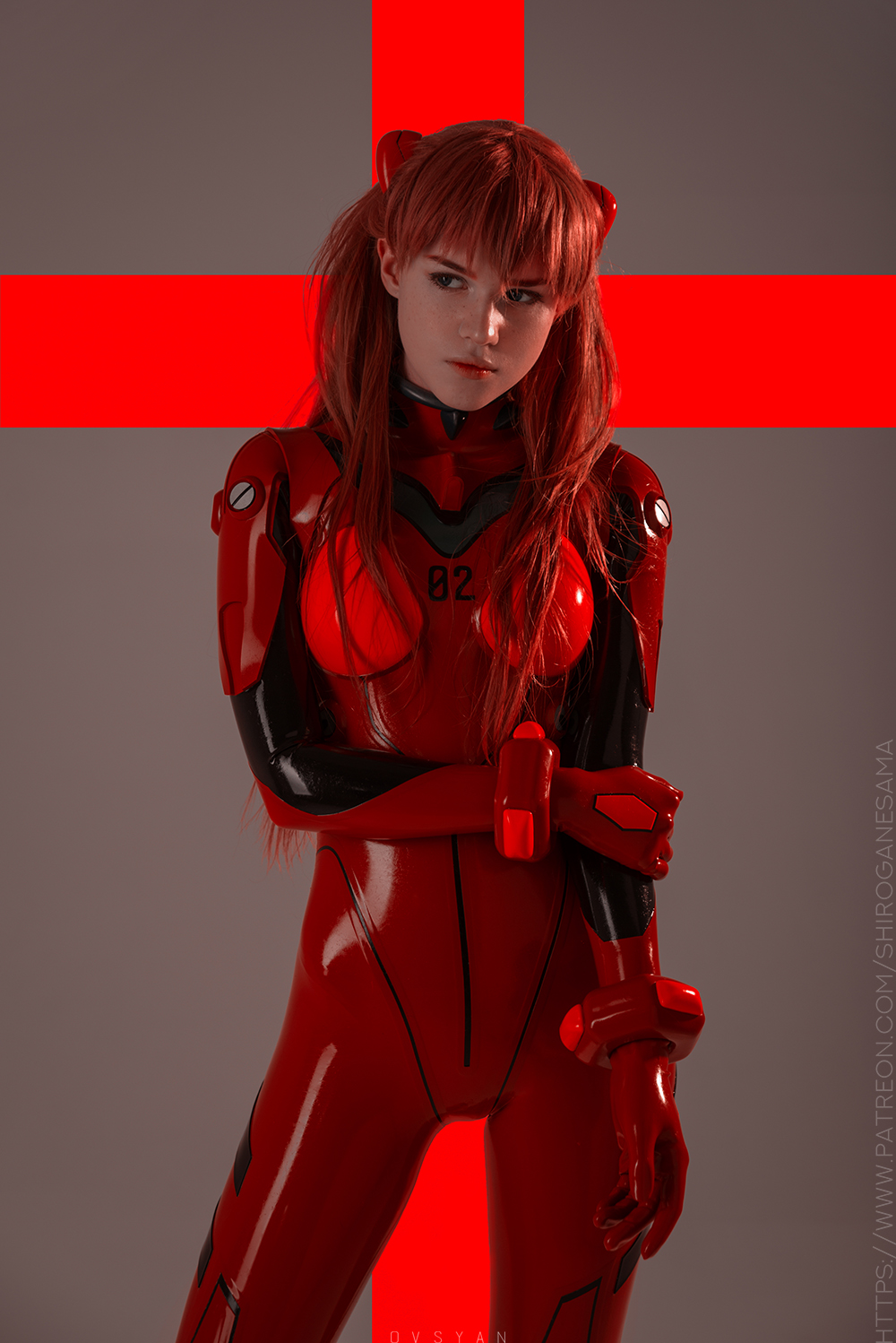 1girl, bodysuit, cosplay, highres, latex, long_hair, looking_to_the_side, neon_genesis_evangelion, non-asian, orange_hair, photo, pilot_suit, plugsuit, solo, souryuu_asuka_langley, watermark, web_address
