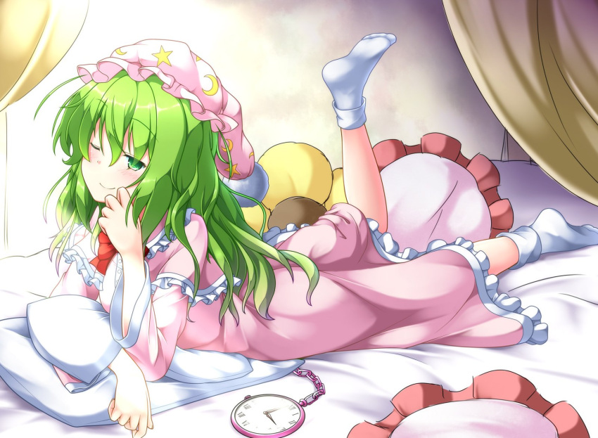 1girl, aka_tawashi, bed, blush, bow, commentary_request, crescent_print, curtains, dress, eyebrows_visible_through_hair, frills, green_eyes, green_hair, hat, highres, kazami_yuuka, kazami_yuuka_(pc-98), long_hair, long_sleeves, looking_at_viewer, lying, neck_bow, nightcap, nightgown, no_shoes, on_stomach, one_eye_closed, one_leg_raised, pillow, pink_dress, pocket_watch, red_bow, red_neckwear, smile, socks, solo, star, star_print, touhou, touhou_(pc-98), watch, white_legwear