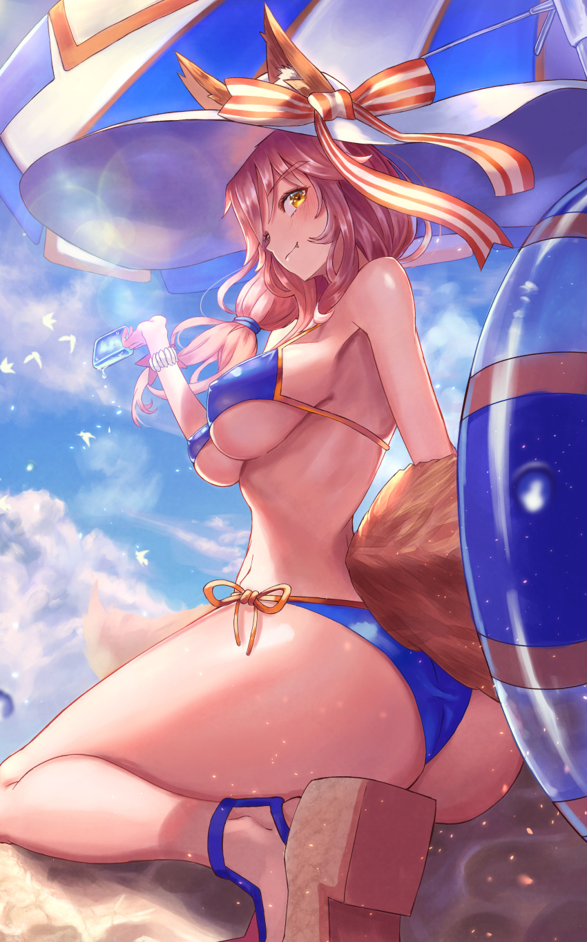 1girl, absurdres, animal_ears, ass, ball, beachball, bikini, bird, blue_bikini, blue_sky, breasts, closed_mouth, clouds, erect_nipples, eyebrows_visible_through_hair, fang, fate/grand_order, fate_(series), food, fox_ears, fox_tail, hat, hat_ribbon, hayataku1234, highres, horizontal_stripes, looking_at_viewer, parasol, pink_hair, popsicle, ribbon, sand, short_hair, side-tie_bikini, sky, smile, solo, striped, striped_ribbon, swimsuit, tail, tamamo_(fate)_(all), tamamo_no_mae_(swimsuit_lancer)_(fate), umbrella, white_hat, yellow_eyes
