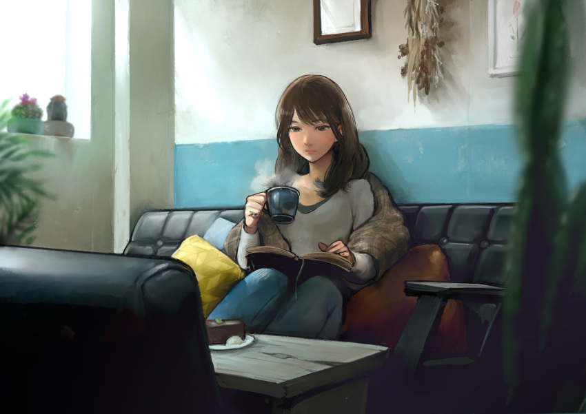 1girl, absurdres, blurry_foreground, book, brown_eyes, brown_hair, cactus, cake, couch, cup, denim, food, highres, idarintarou, indoors, jeans, long_hair, long_sleeves, mug, open_book, original, painting_(object), pants, pillow, plant, potted_plant, reading, restaurant, sitting, solo, table