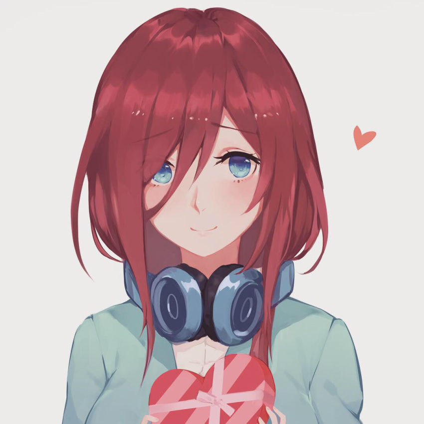 1girl, blue_cardigan, blue_eyes, blush, brown_hair, chocolate, chocolate_heart, collared_shirt