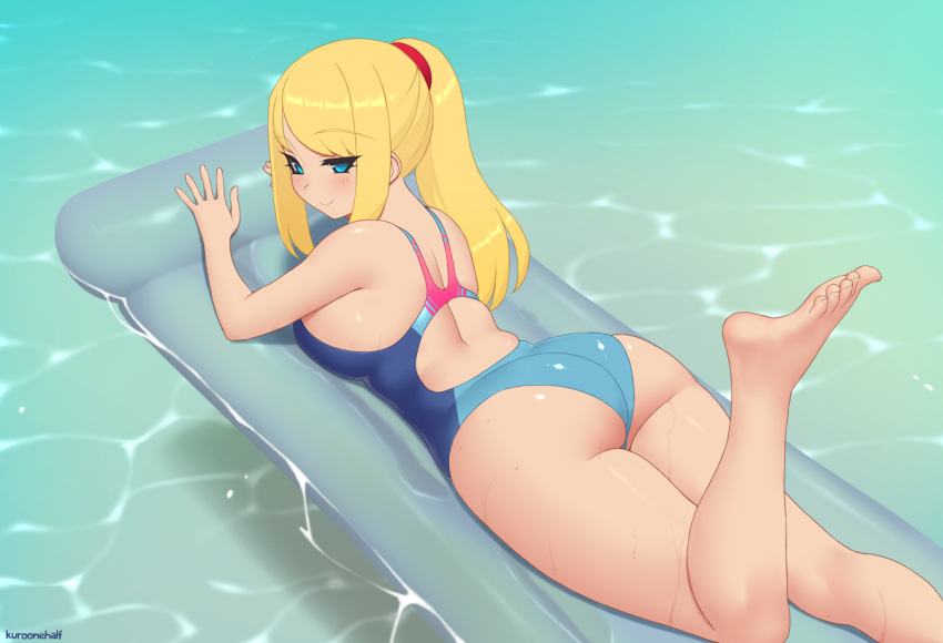 1girl, air_mattress, artist_name, ass, back, bare_shoulders, barefoot, blonde_hair, blue_eyes, breasts, commentary, english_commentary, eyebrows_visible_through_hair, eyes_visible_through_hair, feet, foot_up, from_behind, kuroonehalf, large_breasts, long_hair, looking_at_viewer, looking_back, lying, metroid, nintendo, on_stomach, one-piece_swimsuit, ponytail, samus_aran, skindentation, smile, solo, swimsuit, toes, water, wet