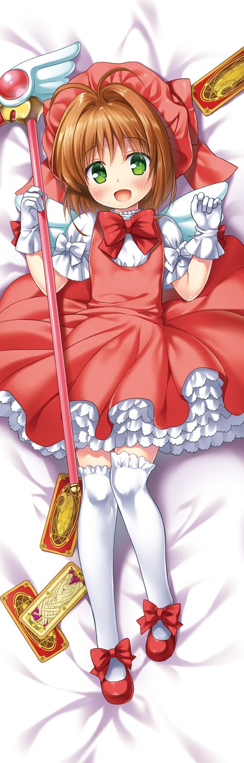 1girl, angel_wings, antenna_hair, brown_hair, card_captor_sakura, clow_card, commentary_request, dakimakura, dress, fly_(clow_card), full_body, fuuin_no_tsue, gloves, green_eyes, hat, highres, kinomoto_sakura, lying, magical_girl, on_back, open_mouth, pink_dress, pink_footwear, pink_headwear, shoes, short_hair, smile, solo, staff, thigh-highs, wand, white_gloves, white_legwear, white_wings, wings, yukino_minato
