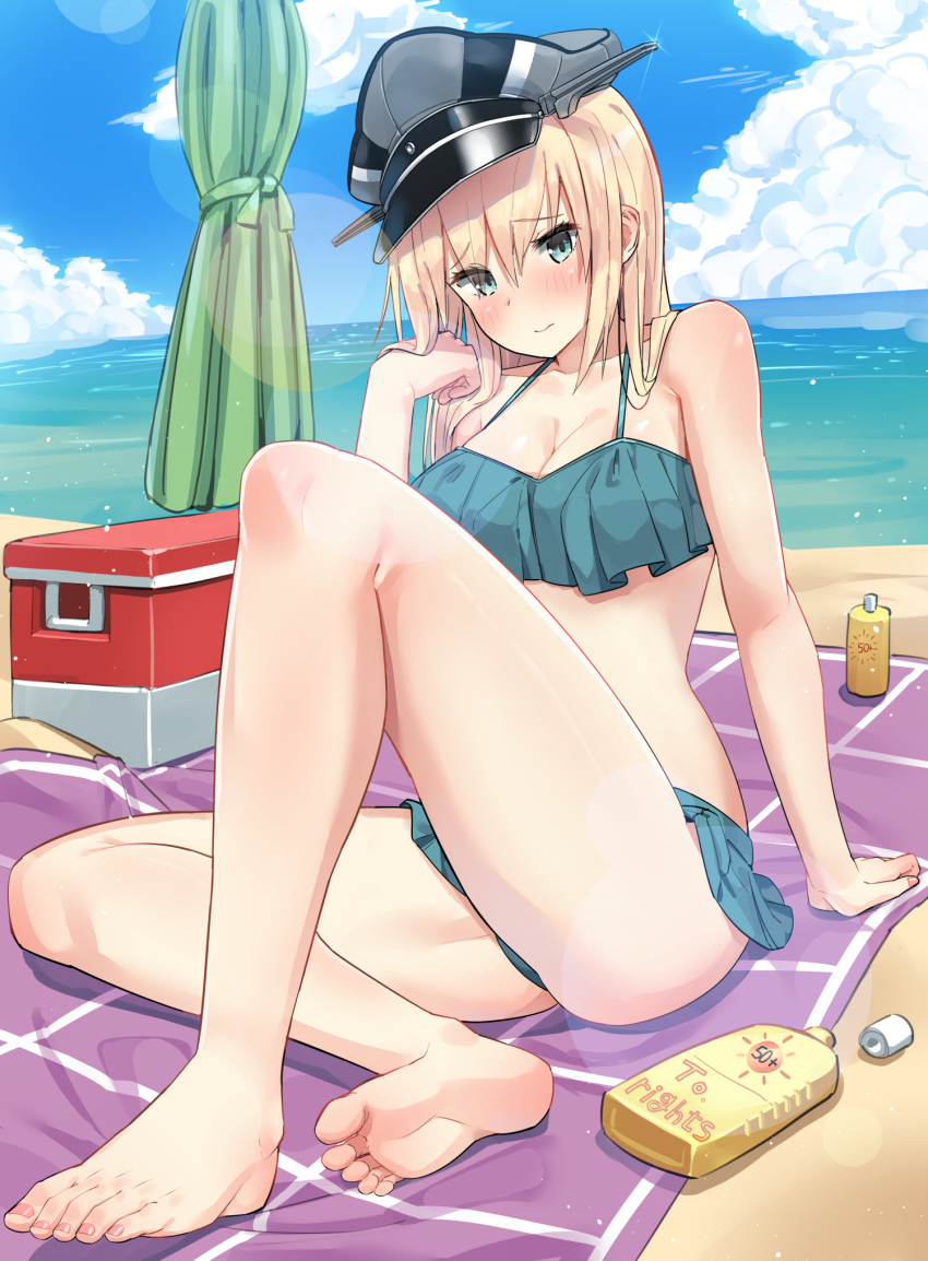 1girl, aqua_eyes, barefoot, beach, bikini, bikini_skirt, bismarck_(kantai_collection), blonde_hair, blush, breasts, closed_mouth, clouds, cloudy_sky, collarbone, commentary_request, commission, cosplay, eyebrows_visible_through_hair, feet, green_bikini, hair_between_eyes, hat, highres, kantai_collection, kasumi_(kantai_collection), kasumi_(kantai_collection)_(cosplay), long_hair, looking_at_viewer, lotion_bottle, ocean, peaked_cap, sitting, sky, soles, solo, soushou_nin, swimsuit, toenails, toes