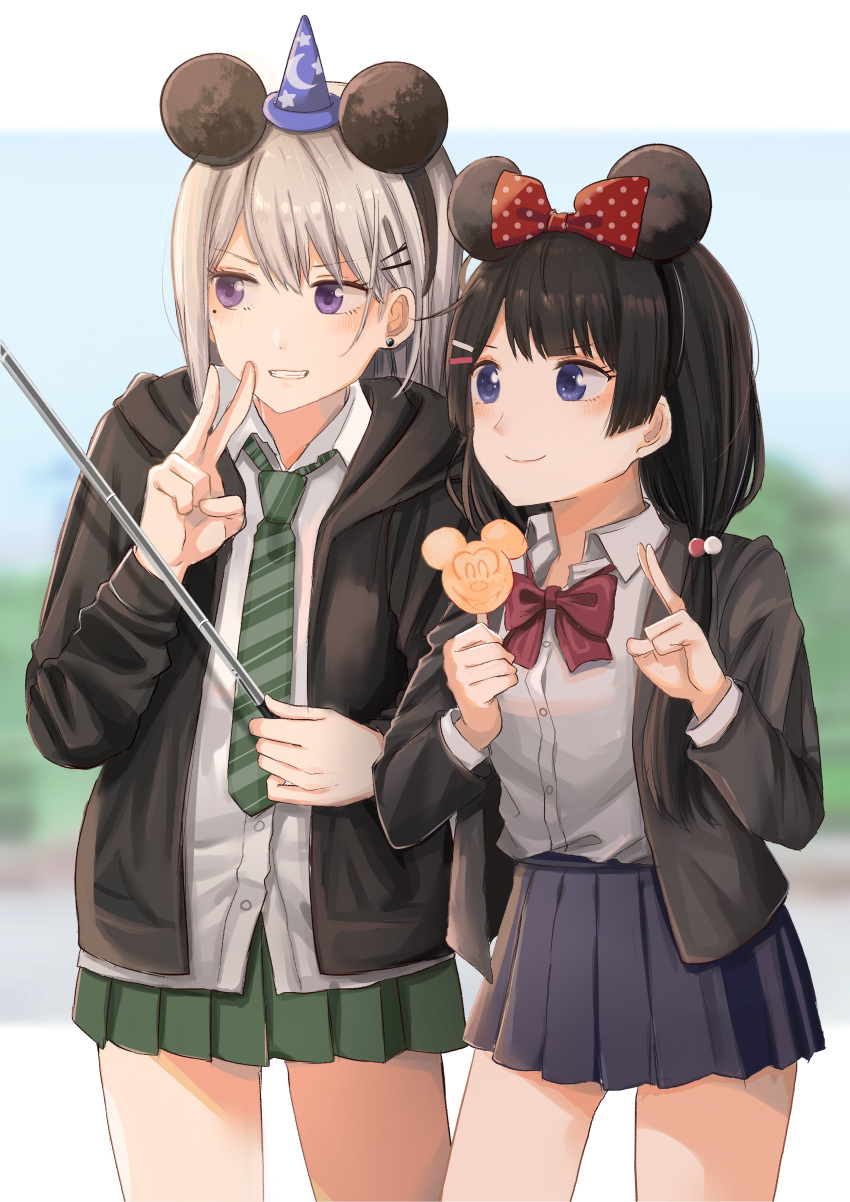 2girls, absurdres, animal_candy, bangs, black_hair, blue_eyes, blue_skirt, character_candy, disney, disneyland, earrings, food, green_skirt, hair_ornament, hairclip, hat, headband, highres, higuchi_kaede, ibuki_(ibuki0118), jewelry, long_hair, mickey_mouse, mickey_mouse_(cameo), mickey_mouse_(series), mickey_mouse_ears, mole, multiple_girls, necktie, nijisanji, pleated_skirt, school_uniform, selfie_stick, skirt, smile, thighs, tied_hair, tokyo_mx, tsukino_mito, v, vest, violet_eyes, virtual_youtuber, white_hair, wizard_hat