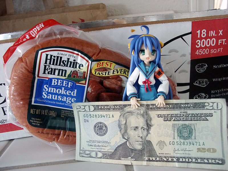 3d, figma, figure, hirano_aya, izumi_konata, lucky_star, mondegreen, money, photo, sausage, seiyuu_connection, suzumiya_haruhi, suzumiya_haruhi_(cosplay), suzumiya_haruhi_no_yuuutsu