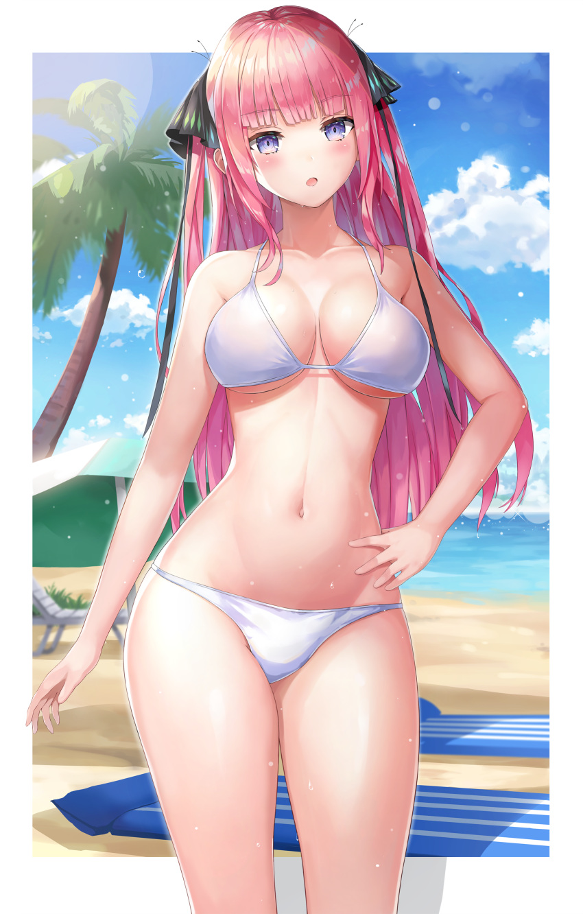 1girl, absurdres, bangs, beach, bikini, black_ribbon, blue_sky, blunt_bangs, blush, breasts, clouds, collarbone, day, eyebrows_visible_through_hair, fishking, go-toubun_no_hanayome, hair_ribbon, hand_on_hip, highres, large_breasts, long_hair, looking_at_viewer, nakano_nino, navel, ocean, open_mouth, outdoors, palm_tree, parasol, pink_hair, ribbon, sand, sky, solo, swimsuit, tree, umbrella, violet_eyes, white_bikini