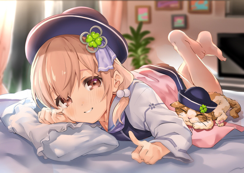1girl, amai_hiyo, amai_hiyo_channel, bed, blurry, blurry_background, blush, brown_eyes, brown_hair, cat, clover_hair_ornament, ekakibito, four-leaf_clover_hair_ornament, hair_ornament, hat, highres, legs_up, looking_at_viewer, lying, official_art, on_stomach, picture_frame, pillow, short_hair, solo, television, virtual_youtuber