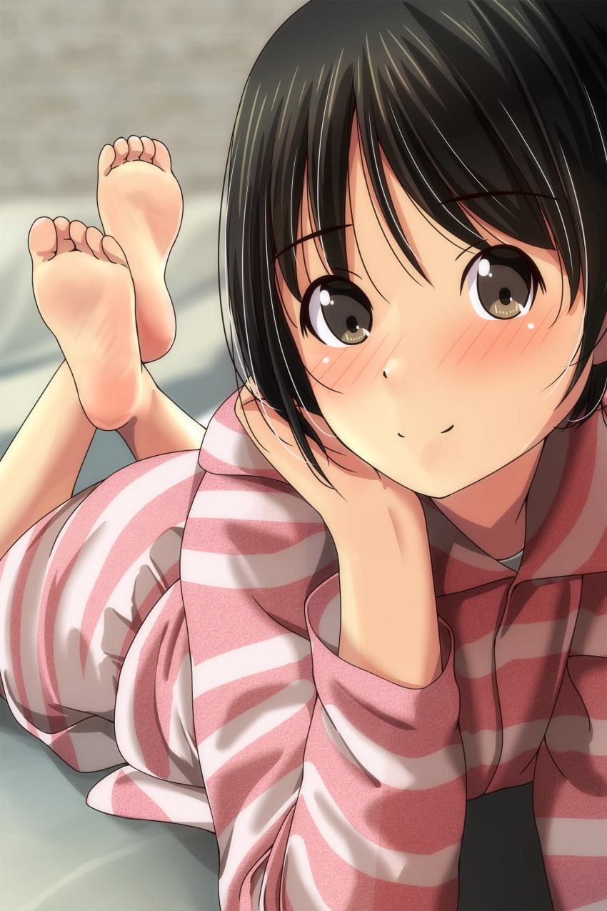 1girl, absurdres, arm_support, bangs, barefoot, black_hair, blurry, blurry_background, blush, brown_eyes, closed_mouth, depth_of_field, eyebrows_visible_through_hair, head_in_hand, highres, hood, hood_down, hooded_jacket, jacket, legs_up, long_sleeves, looking_at_viewer, loungewear, lying, matsunaga_kouyou, nose_blush, on_stomach, original, shorts, smile, soles, solo, striped, striped_jacket, striped_shorts