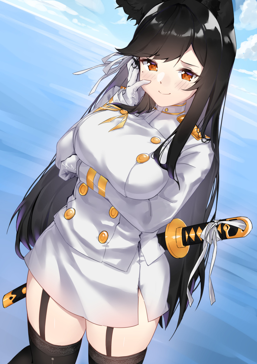 1girl, absurdres, animal_ears, atago_(azur_lane), azur_lane, black_hair, blue_sky, blush, breasts, brown_eyes, closed_mouth, clouds, day, dy_kai, eyebrows_visible_through_hair, garter_straps, gloves, hair_ribbon, hand_up, highres, katana, large_breasts, long_hair, looking_at_viewer, military, military_uniform, mole, mole_under_eye, ocean, ribbon, sky, smile, solo, standing, sword, thigh-highs, uniform, weapon, white_gloves, white_ribbon