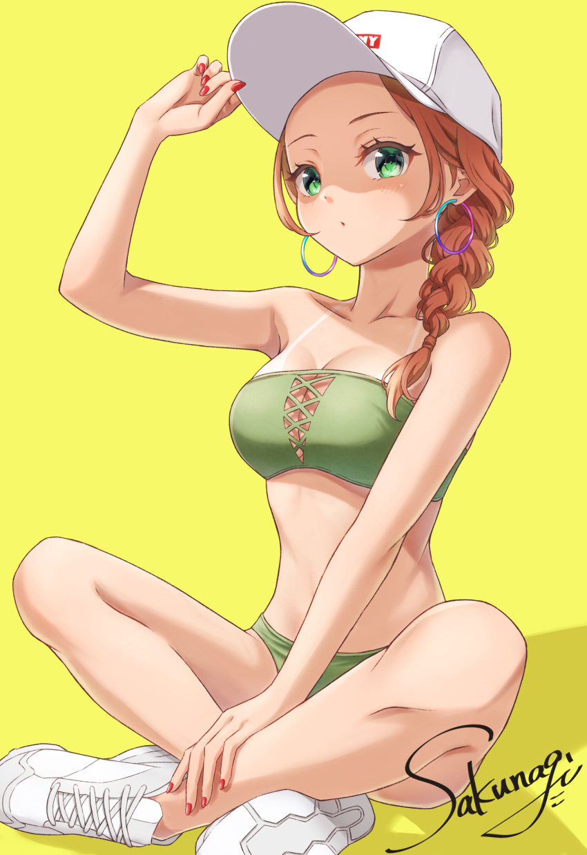 1girl, arm_up, bare_arms, bare_shoulders, baseball_cap, bikini, braid, breasts, brown_hair, earrings, expressionless, green_bikini, green_eyes, hair_over_shoulder, hat, highres, hoop_earrings, indian_style, jewelry, long_hair, looking_at_viewer, medium_breasts, nail_polish, namin_(namin1317), original, red_nails, shoes, signature, simple_background, single_braid, sitting, strapless, strapless_bikini, swimsuit, tan, tanline, white_footwear, white_headwear, yellow_background