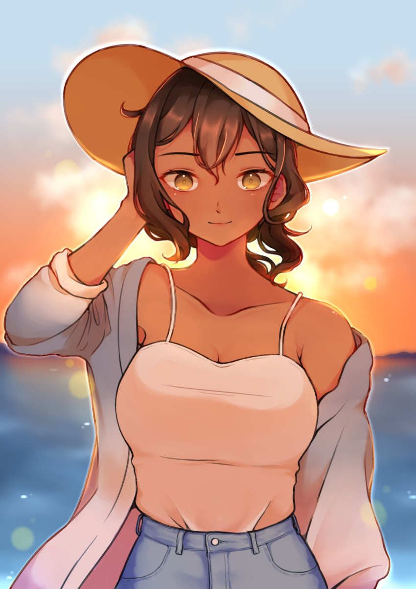 1girl, brown_hair, butterfly_soup, dark_skin, denim, diya_(butterfly_soup), hand_in_hair, hat, highres, jeans, looking_at_viewer, ocean, outdoors, pants, ponytail, sky, smile, solo, strawberiisoda, sun_hat, sunset, tank_top, yellow_eyes