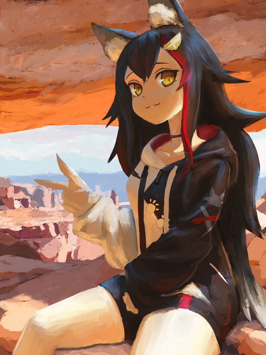 1girl, :3, animal_ear_fluff, animal_ears, bare_legs, black_choker, black_hair, black_hoodie, black_shorts, breasts, choker, closed_mouth, commentary, day, hair_ornament, highres, hololive, hood, hoodie, long_hair, long_sleeves, looking_at_viewer, medium_breasts, mozuya_(hisai), multicolored_hair, ookami_mio, outdoors, paw_print_pattern, redhead, rock, short_shorts, shorts, sitting, smile, solo, streaked_hair, tail, thighs, two-tone_hair, two-tone_sweater, v, virtual_youtuber, white_hoodie, wolf_ears, wolf_tail, yellow_eyes