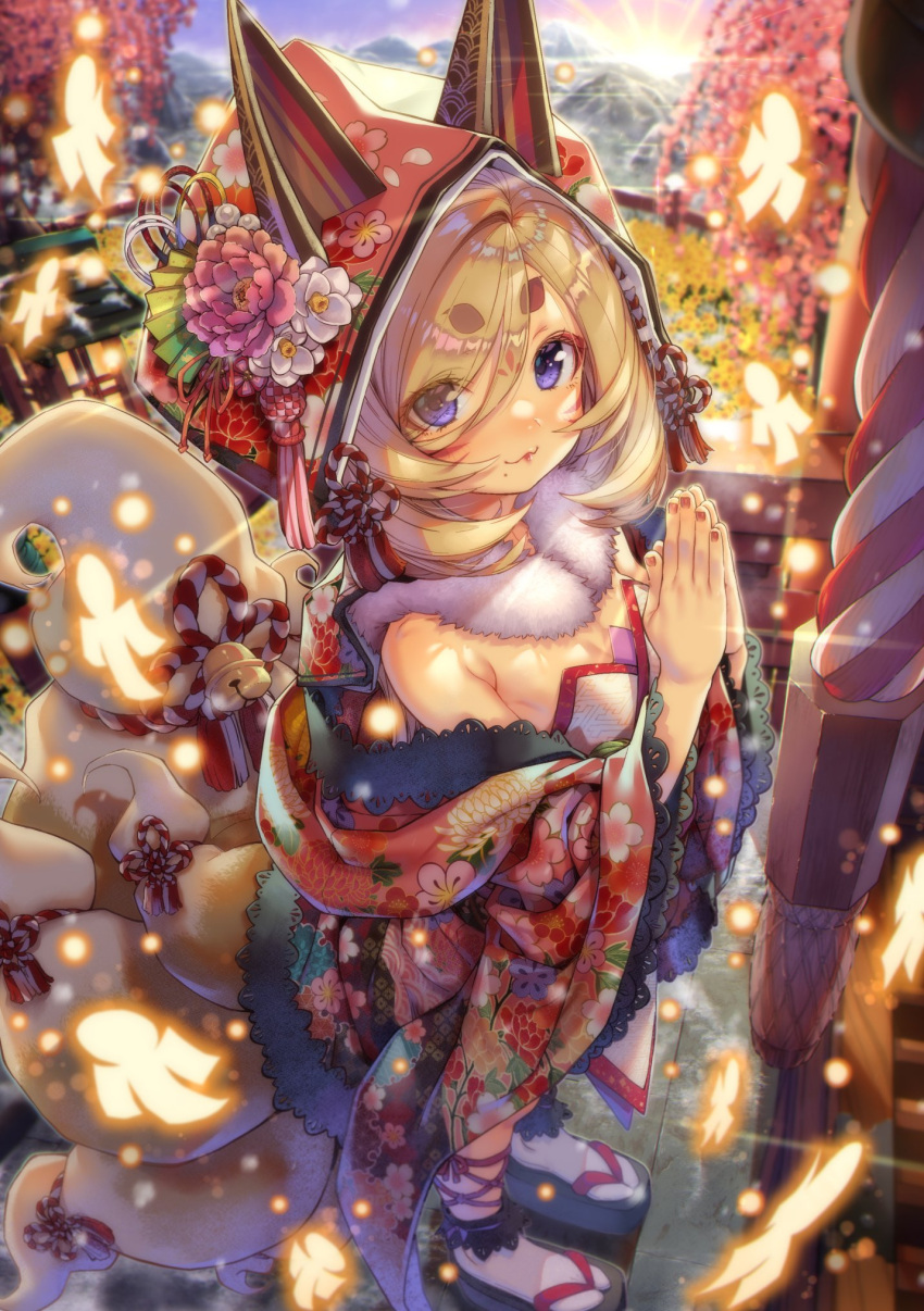 1girl, animal_hood, bare_shoulders, bell, blonde_hair, blue_eyes, blush, box, commentary_request, donation_box, facial_mark, floral_print, flower, forehead_mark, fox_hood, fox_tail, full_body, fur_trim, hands_clasped, hands_together, hatsumoude, highres, hood, japanese_clothes, jingle_bell, kimono, kink, kitsune, kouhaku_nawa, kyuubi, light_particles, long_hair, looking_at_viewer, mole, mole_under_mouth, mountain, mountainous_horizon, multiple_tails, new_year, off-shoulder_kimono, original, own_hands_together, platform_footwear, print_kimono, rope, sandals, short_eyebrows, shrine, shrine_bell, socks, solo, sunrise, tabi, tail, tail_ornament, thick_eyebrows, towako_(akane_shinsha), tree, whisker_markings, zouri