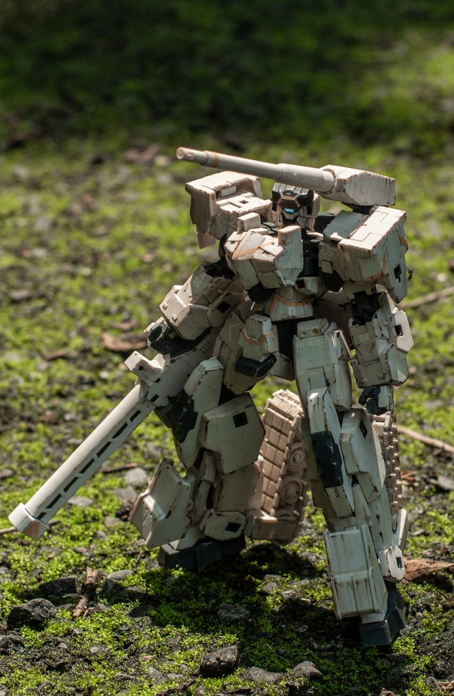 clenched_hands, frame_arms, from_above, gourai_kai_(frame_arms), gun, holding, holding_gun, holding_weapon