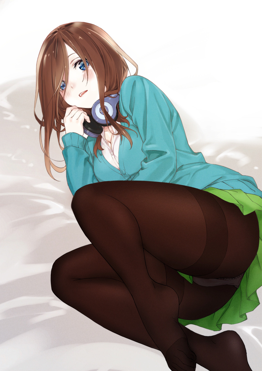 1girl, absurdres, ass, bangs, bed_sheet, black_legwear, blue_cardigan, blue_eyes