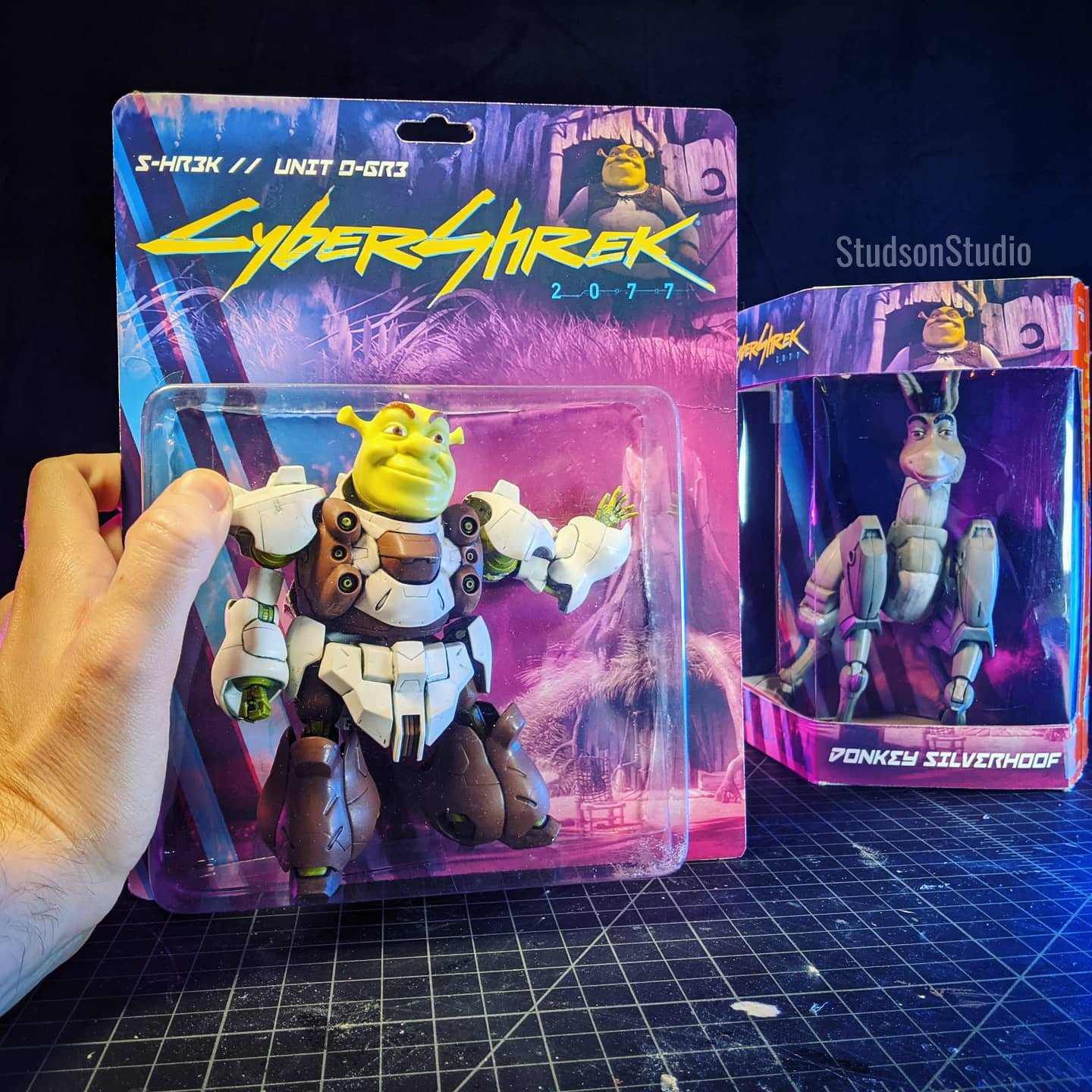 artist_name, box, clenched_hand, crossover, cyberpunk_2077, donkey, donkey_(shrek), english_commentary